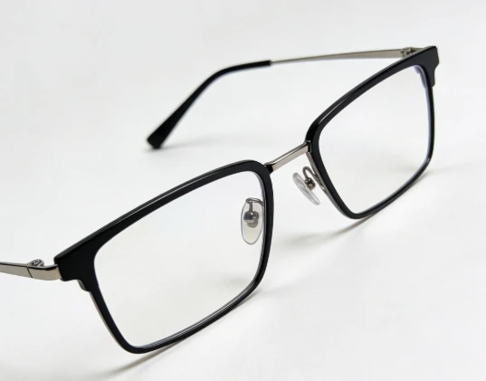 Why are titanium frames considered a boon for people with allergies?
